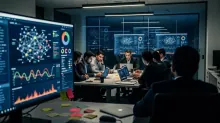 Un grupo de profesionales en una reunión de trabajo en una sala con pantallas